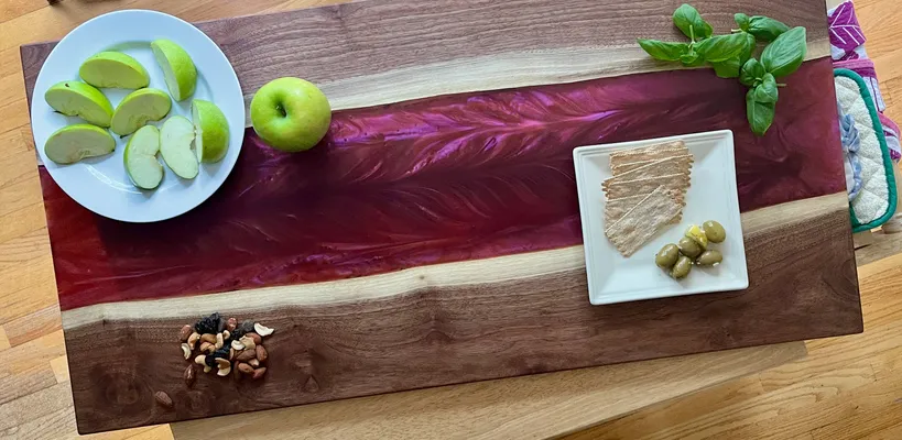 Charcuterie board, Black Walnut and dragon's breath epoxy